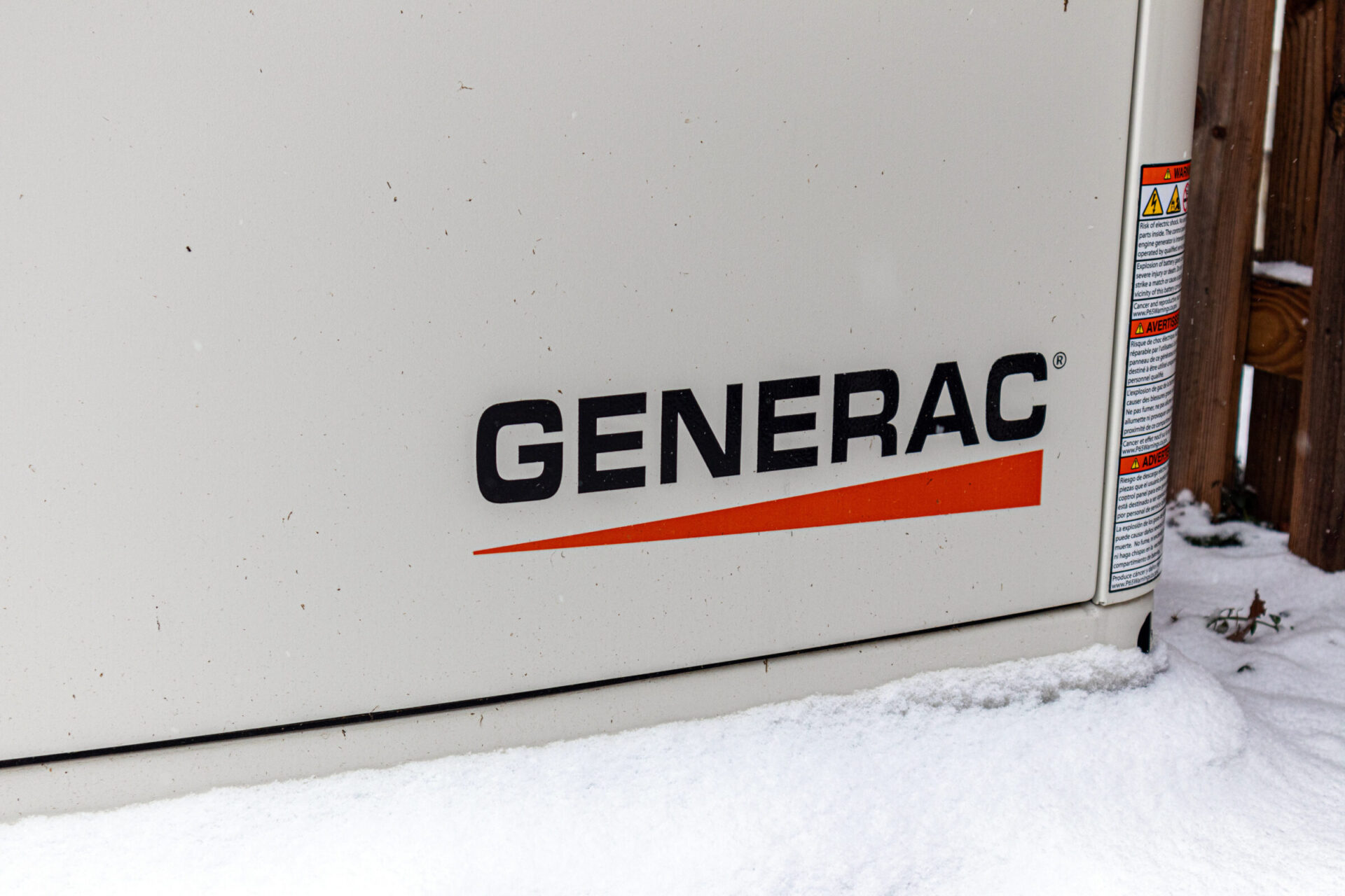 Close up of a Generac Generator in snow.